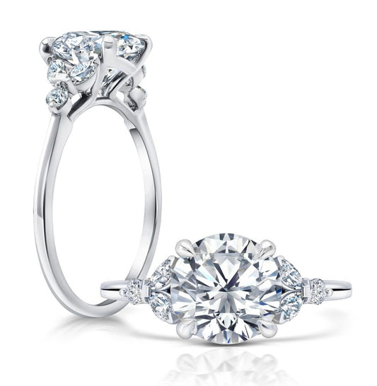 Peter Storm Peter adds a modern flair to this cluster three stone ring WSM681_4DiaW WSM681_4DiaW