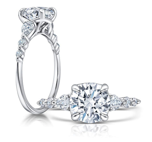 Peter Storm A classic twist on a three stone ring, this ring features two pear shape diamonds sitting on either side of your chosen center WSM675_4DIAW WSM675_4DIAW