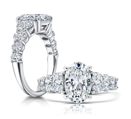 Peter Storm Peter adds a modern flair to this cluster three stone ring WSM679_4DIAW WSM679_4DIAW