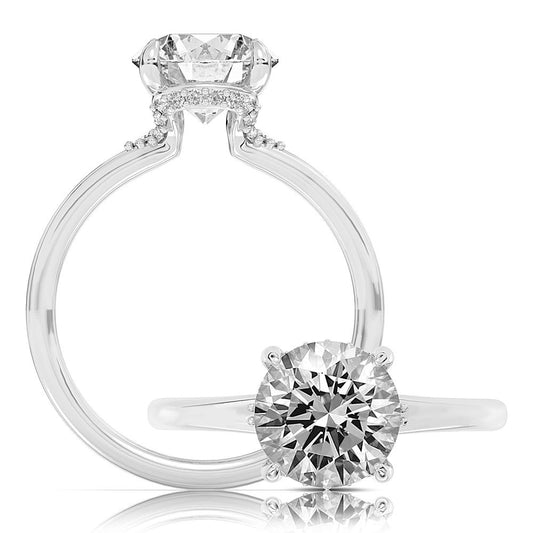 Peter Storm This playful ring features a flower-shaped halo with a sparkling round center WSM743_4DiaW  WSM743_4DiaW