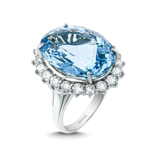 Aquamarine Halo Ring in Platinum with Diamonds