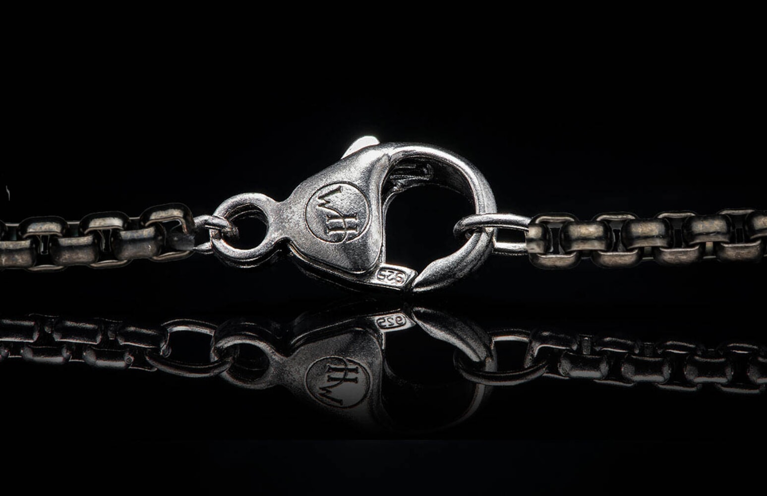 William Henry Titanium Knife pendant featuring Dichrolam®, and hand-forged damascus blade B02 FLASH