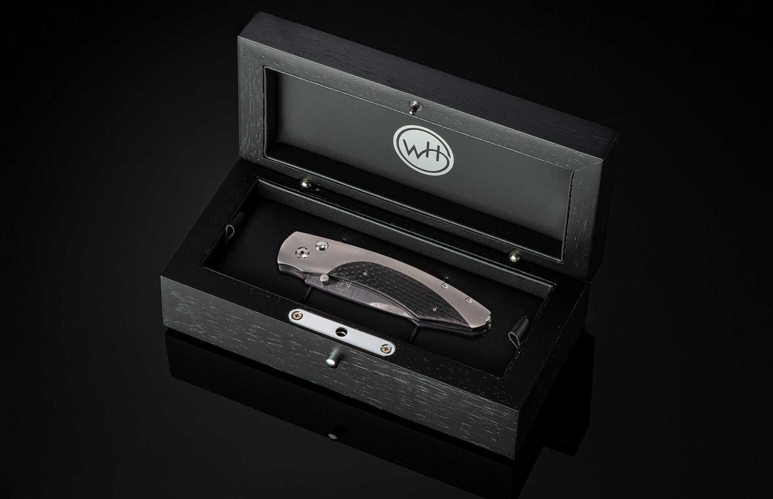 William Henry Titanium pocketknife with carbon fiber and 'wave' damascus blade B12 VEGA