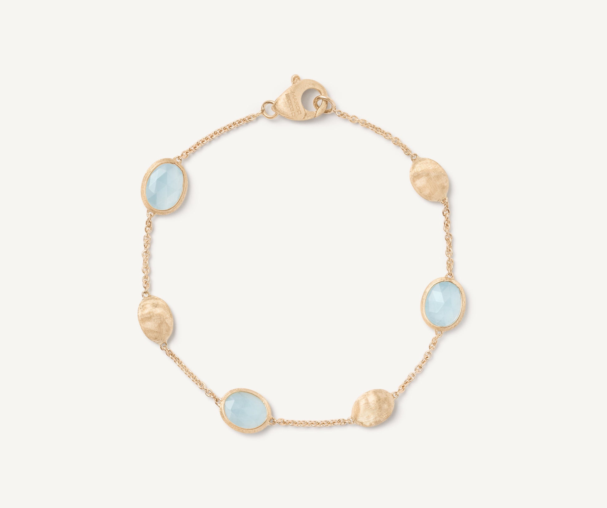 18kt yellow gold bracelet with oval elements and aquamarine