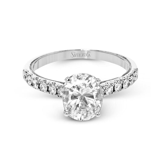 oval-cut-engagement-ring-in-18k-gold-with-diamonds