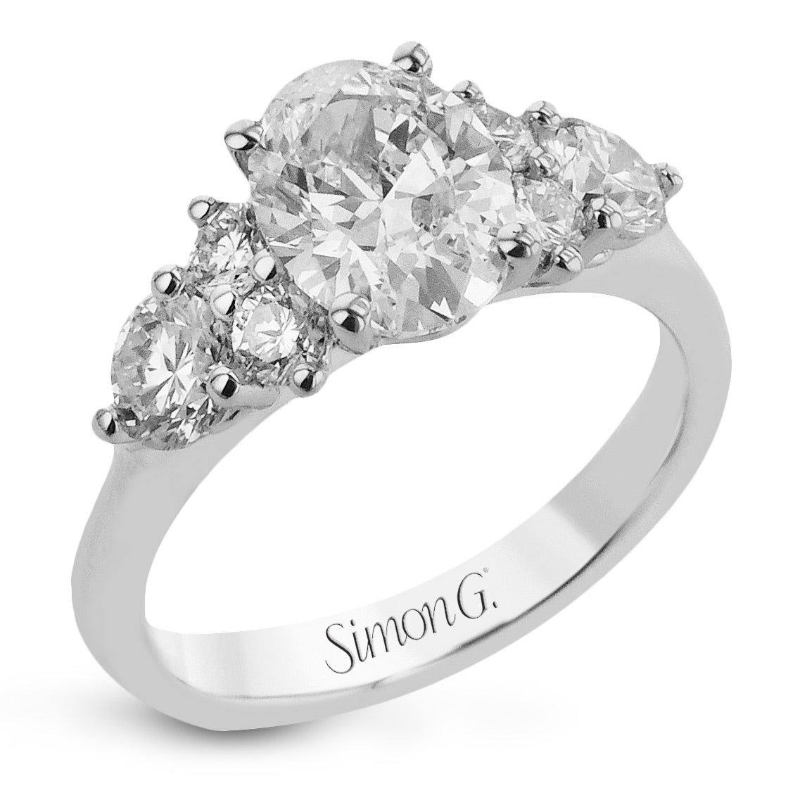 oval-cut-three-stone-engagement-ring-in-18k-gold-with-diamonds