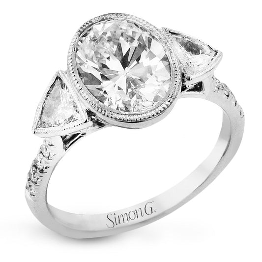 oval-cut-three-stone-engagement-ring-in-18k-gold-with-diamonds