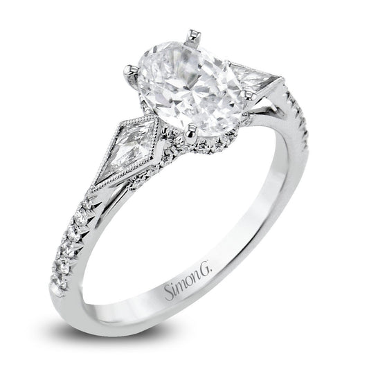 oval-cut-three-stone-engagement-ring-in-18k-white-gold-with-diamonds