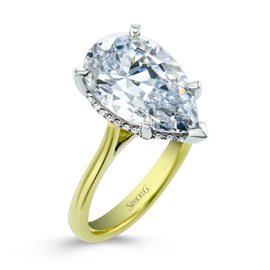 pear-cut-hidden-halo-engagement-ring-in-18k-gold-with-diamonds