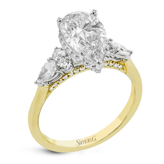 pear-cut-three-stone-engagement-ring-in-18k-gold-with-diamonds
