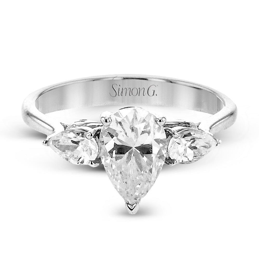 pear-cut-three-stone-engagement-ring-in-18k-gold-with-diamonds