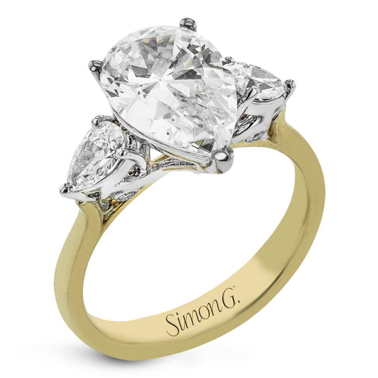 pear-cut-three-stone-engagement-ring-in-18k-gold-with-diamonds