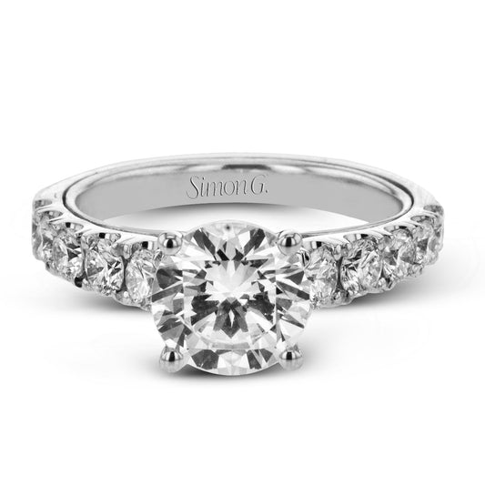 round-cut-engagement-ring-in-18k-gold-with-diamonds
