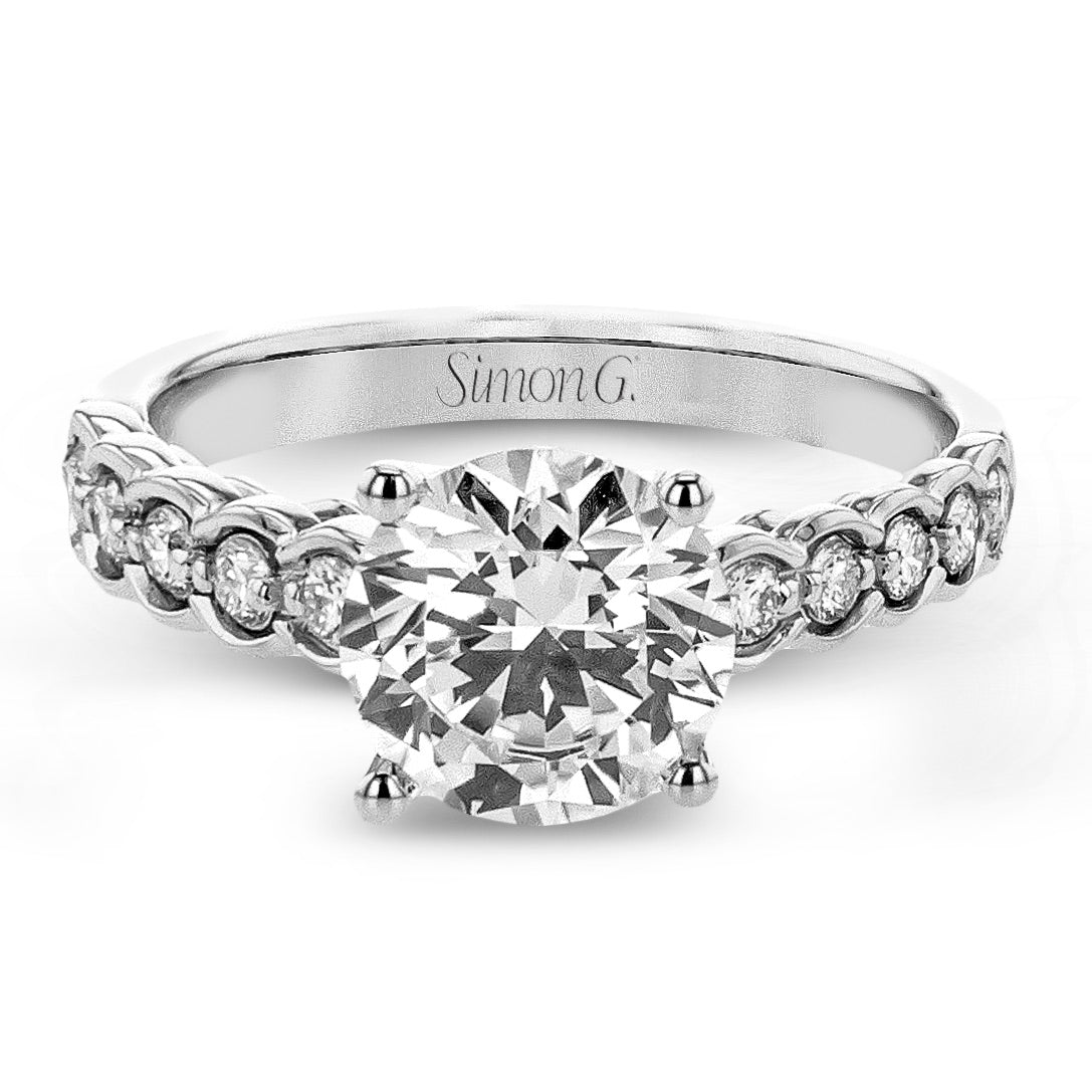 round-cut-engagement-ring-in-18k-gold-with-diamonds