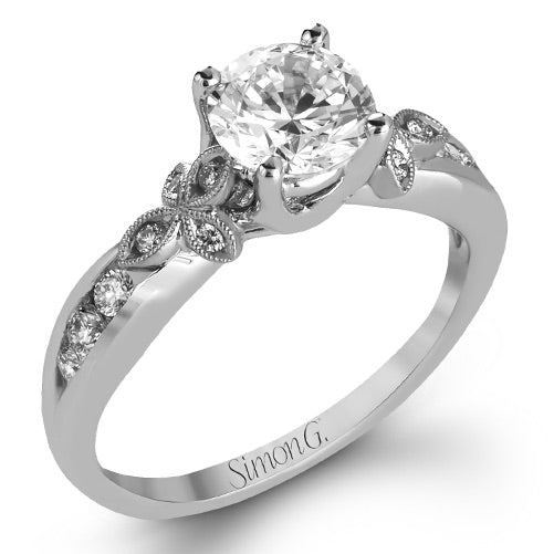 round-cut-engagement-ring-in-18k-gold-with-diamonds