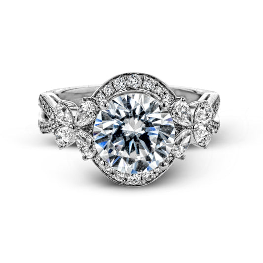 round-cut-halo-engagement-ring-in-18k-gold-with-diamonds