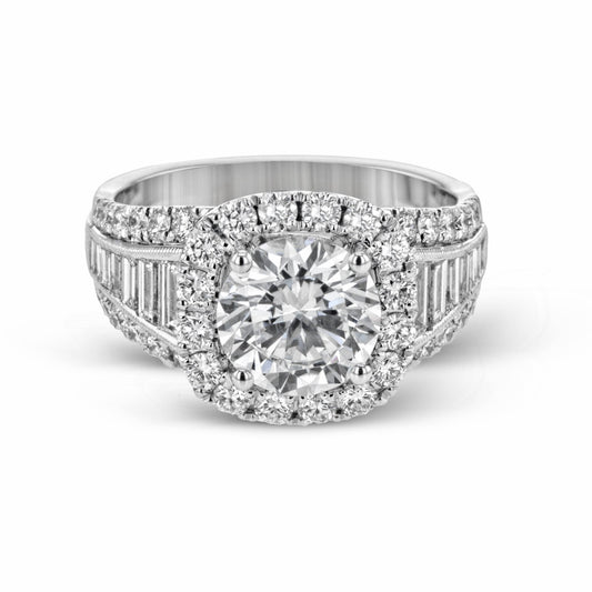 round-cut-halo-engagement-ring-in-18k-gold-with-diamonds
