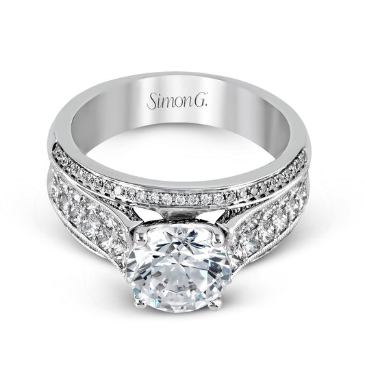 round-cut-simon-set-engagement-ring-in-18k-gold-with-diamonds