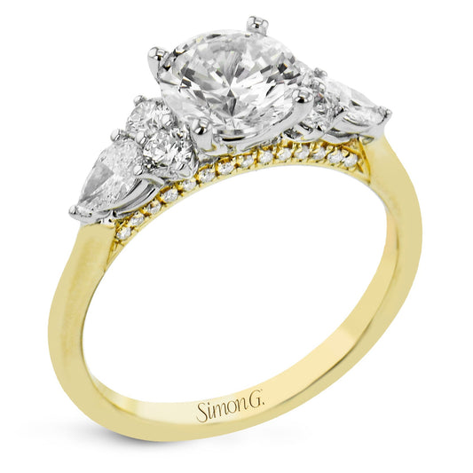 round-cut-three-stone-engagement-ring-in-18k-gold-with-diamonds