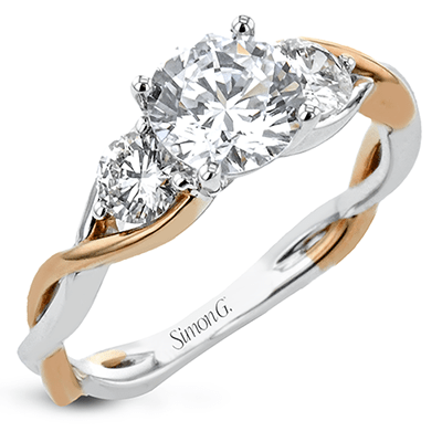 round-cut-three-stone-engagement-ring-in-18k-gold-with-diamonds