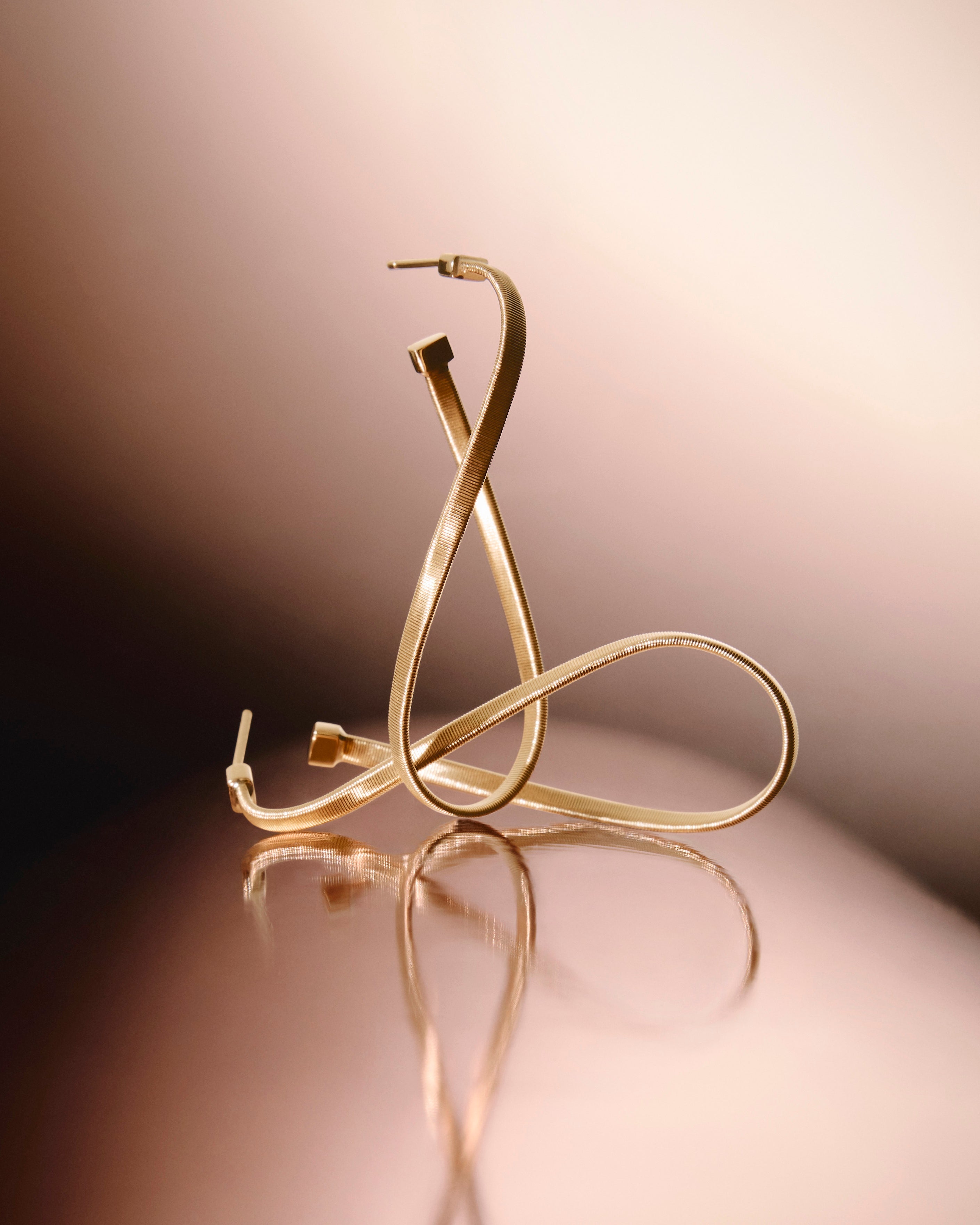 18kt yellow gold twisted irregular hoop earrings, medium