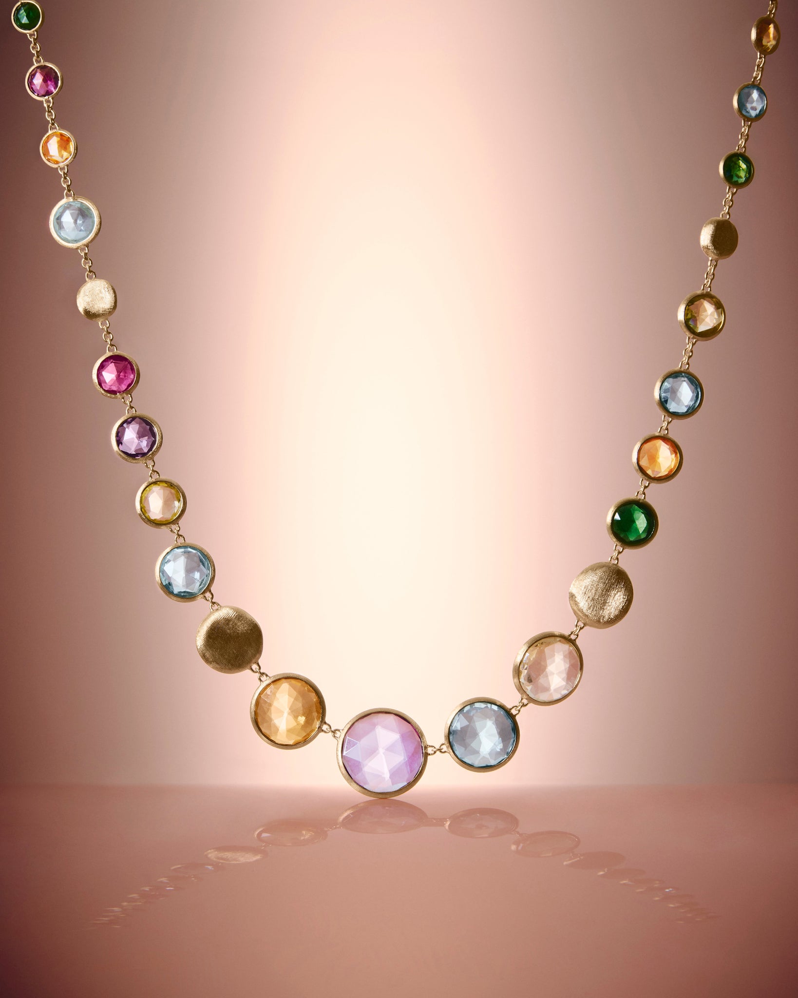 Large gold necklace with multicoloured gemstones