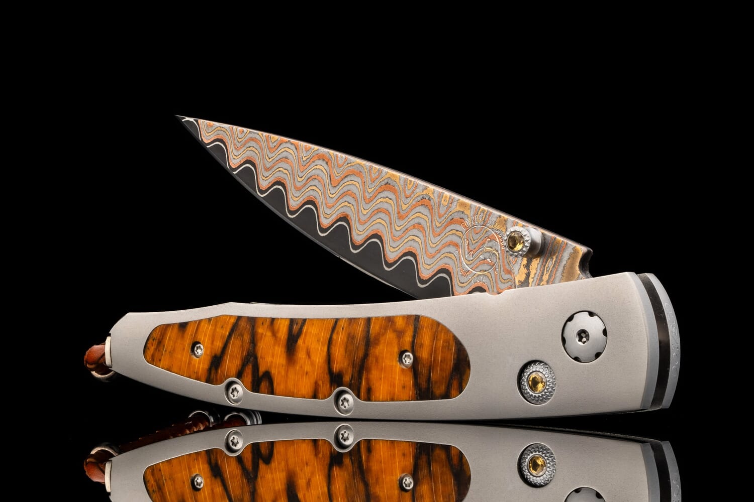 William Henry Titanium pocket knife featuring Beech wood and 'copper wave' damascus blade B10 BEECH
