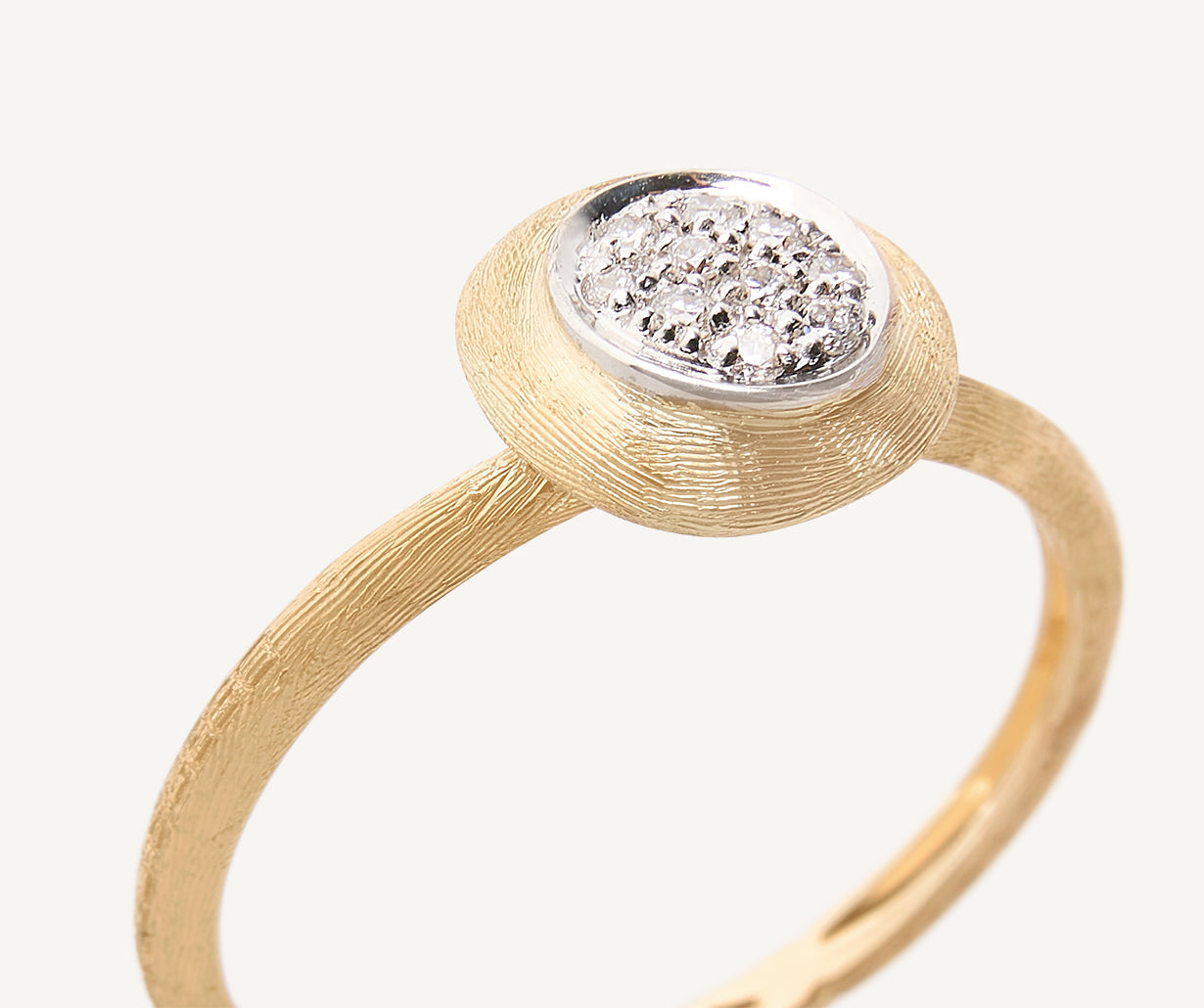 Ring with diamond pavé disk
