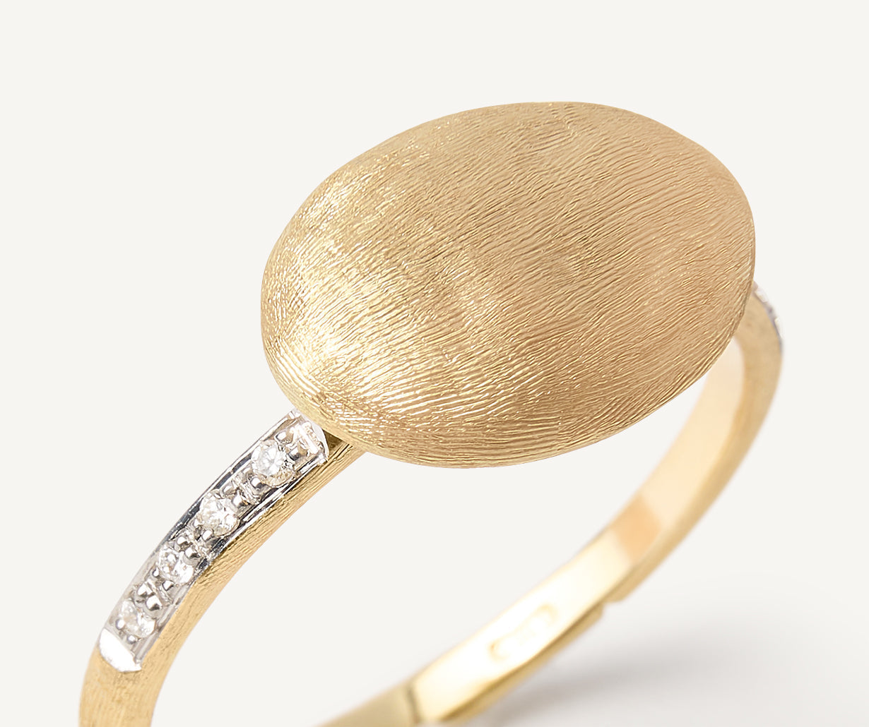 ring-with-horizontal-oval-element-and-diamond-shank