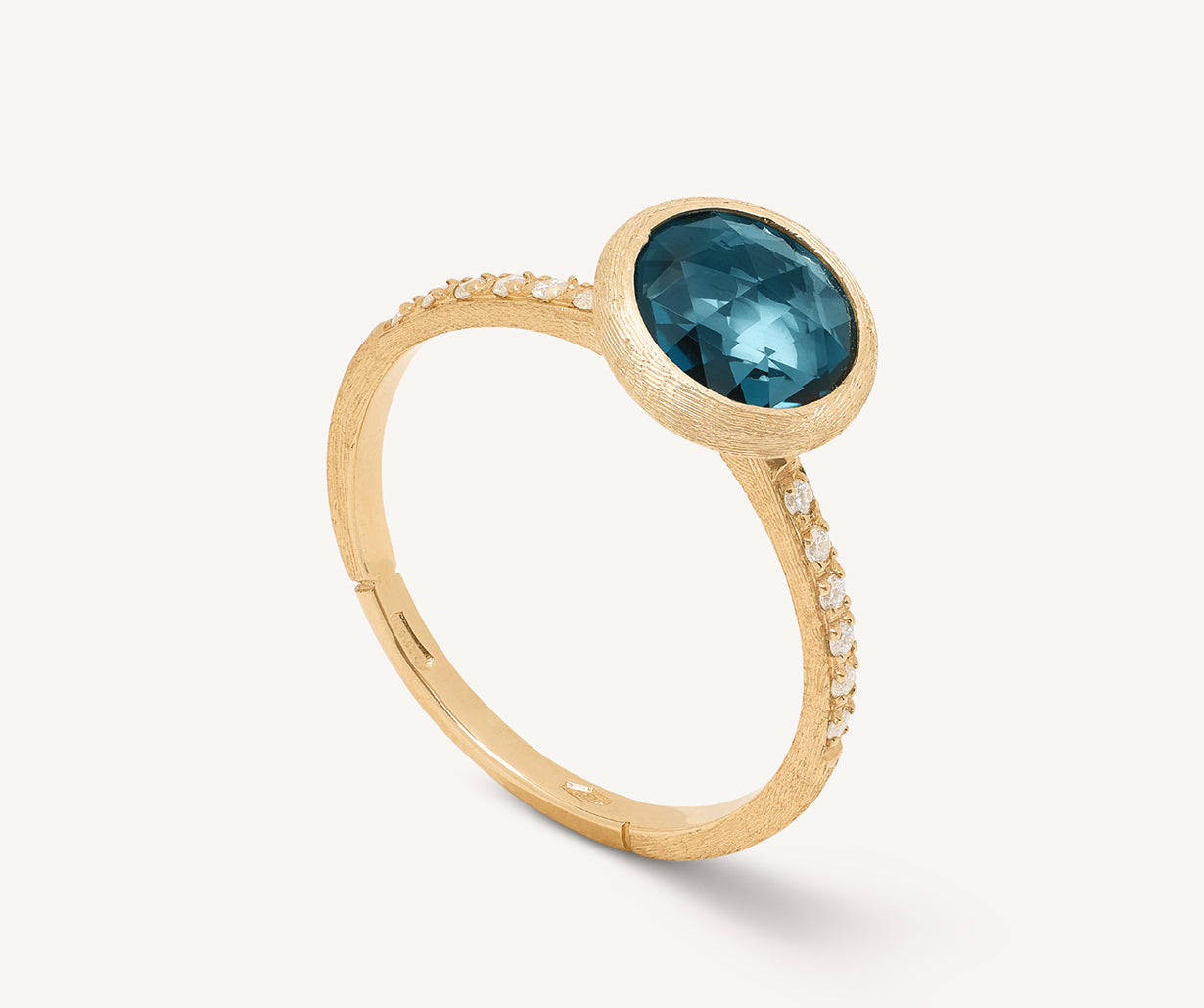 18kt yellow gold ring with London blue Topaz and diamonds