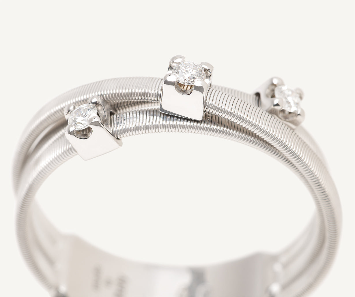 three-strand-white-gold-ring-with-diamonds