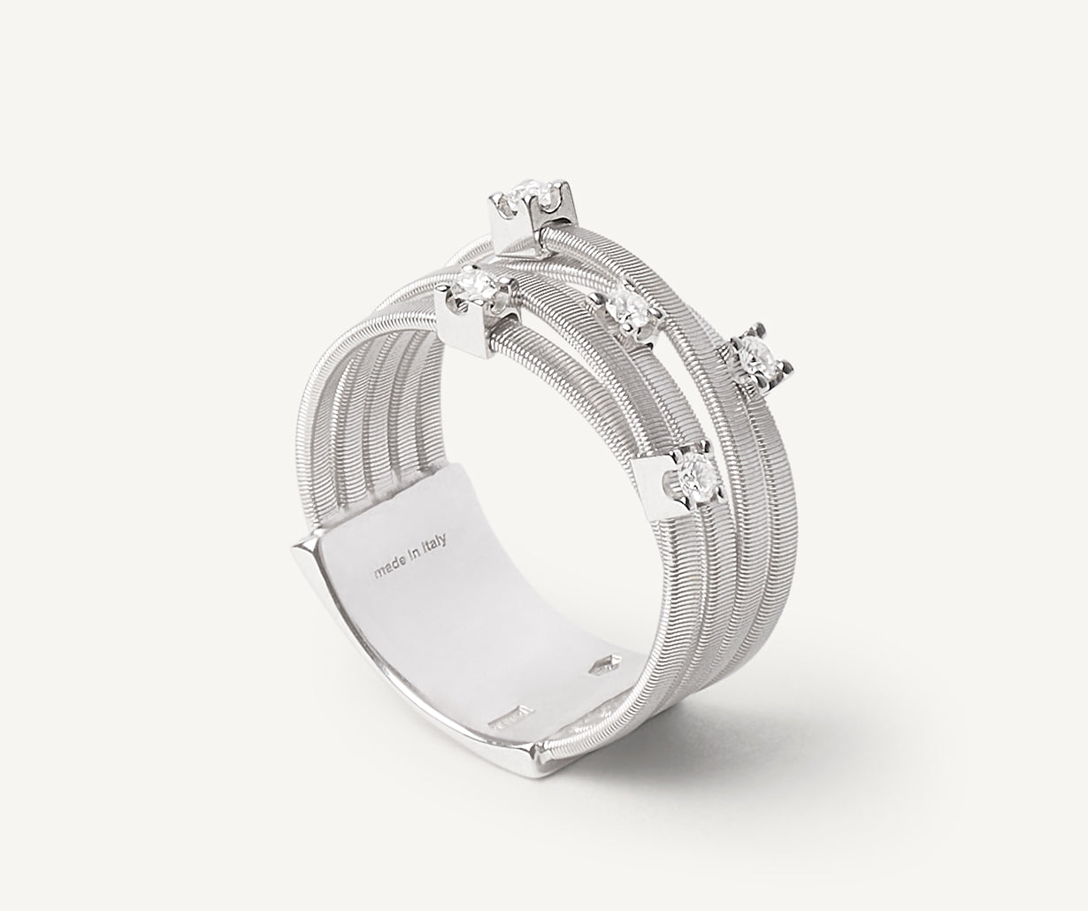 Five-band White gold ring with prong-set diamonds and a diamond-studded plaque