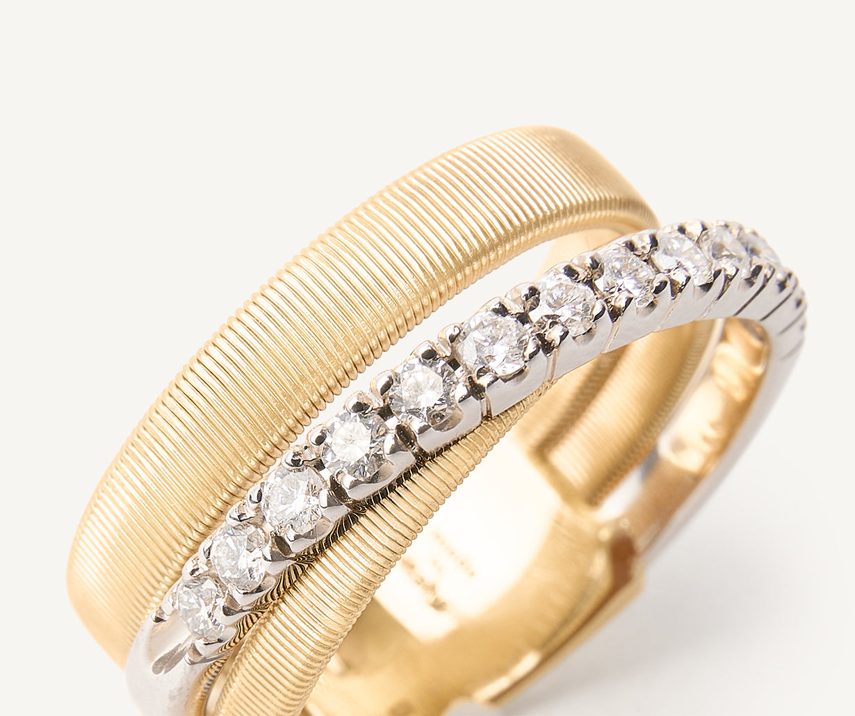 Ring with diamond-studded plaque, medium