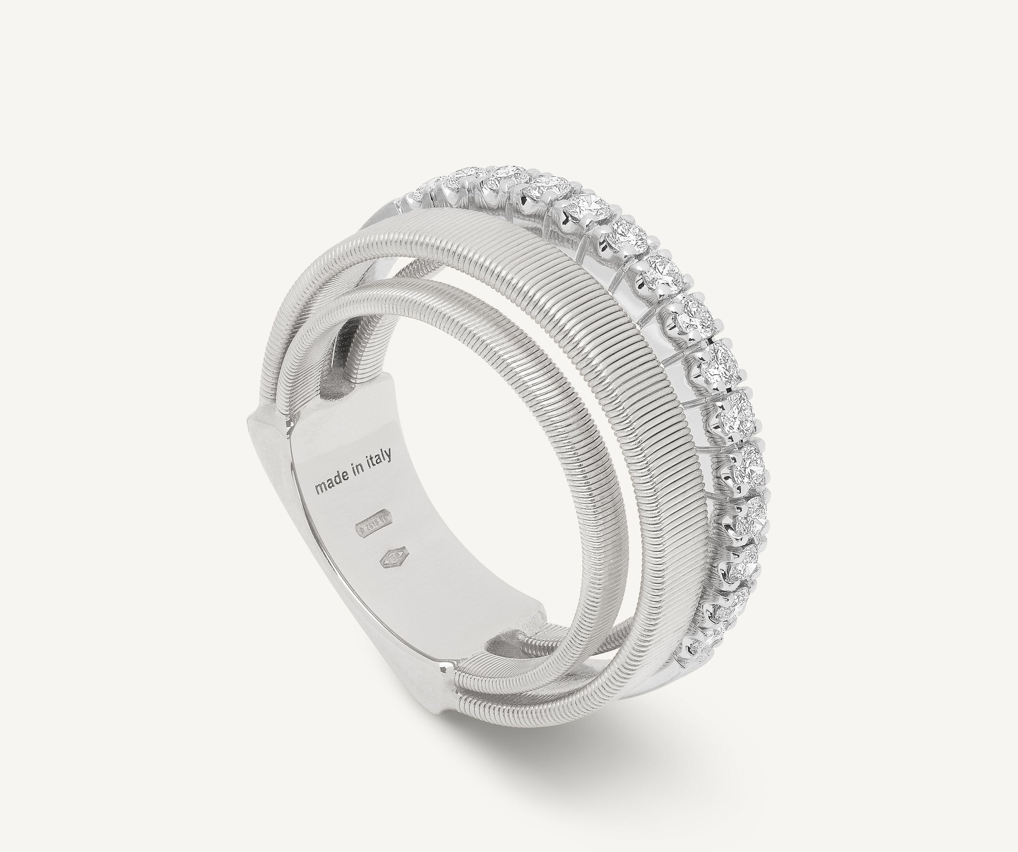 18kt white gold 4-strand coil ring with diamond pav band