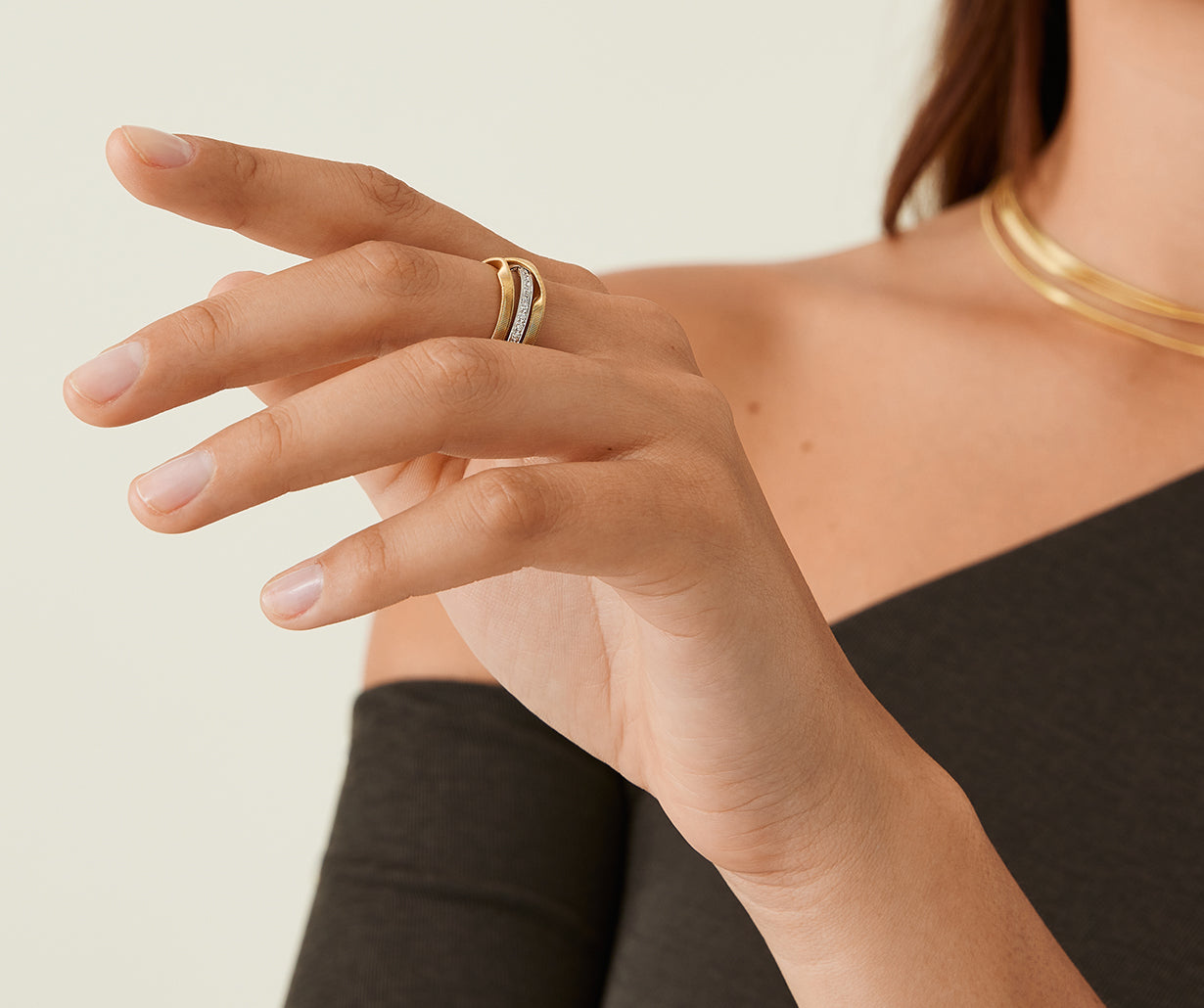 18kt-yellow-gold-three-strand-coil-ring-with-diamonds