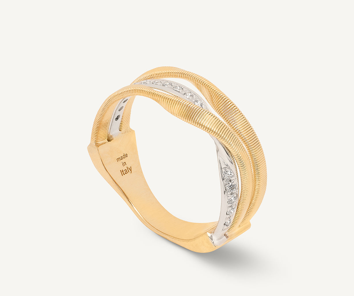 18kt yellow gold three-strand coil ring with diamonds