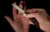 William Henry Automatic opening folding knife with 'Wave' mokume and woolly mammoth tooth B22 MAMMUT