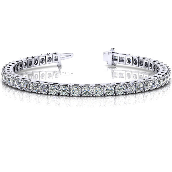 This Bracelet is available in 14K White Gold. There are a total of 74 stones. There are Round with a total carat weight of 1.5 set in a Prong Set setting.