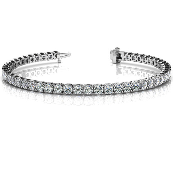 This Bracelet is available in 14K White Gold. There are a total of 44 stones. There are Round with a total carat weight of 10 set in a  setting.
