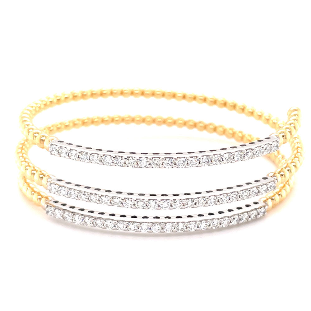 This Bracelet is available in 14K Yellow & White Gold. There are a total of 63 stones. There are Round with a total carat weight of 1.86 set in a  setting.