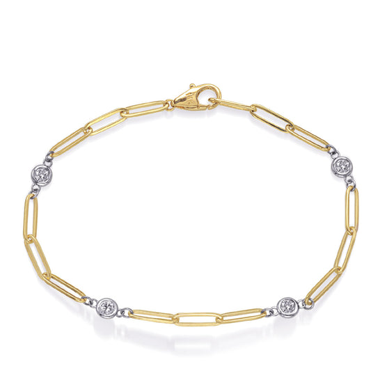 This Bracelet is available in 14K Yellow & White Gold. There are a total of 4 stones. There are Round with a total carat weight of 0.34 set in a Bezel Set setting.