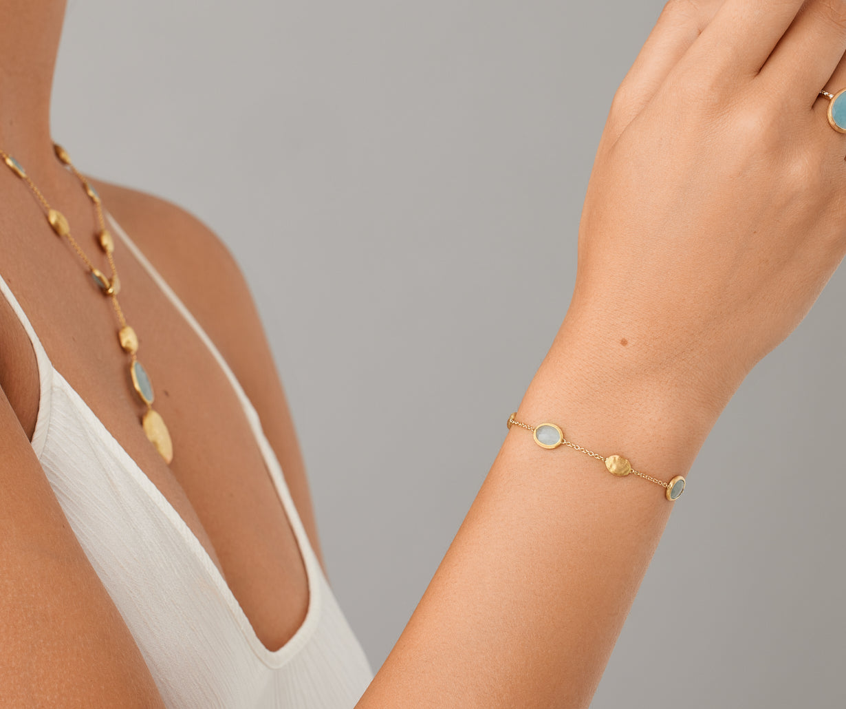 18kt yellow gold bracelet with oval elements and aquamarine