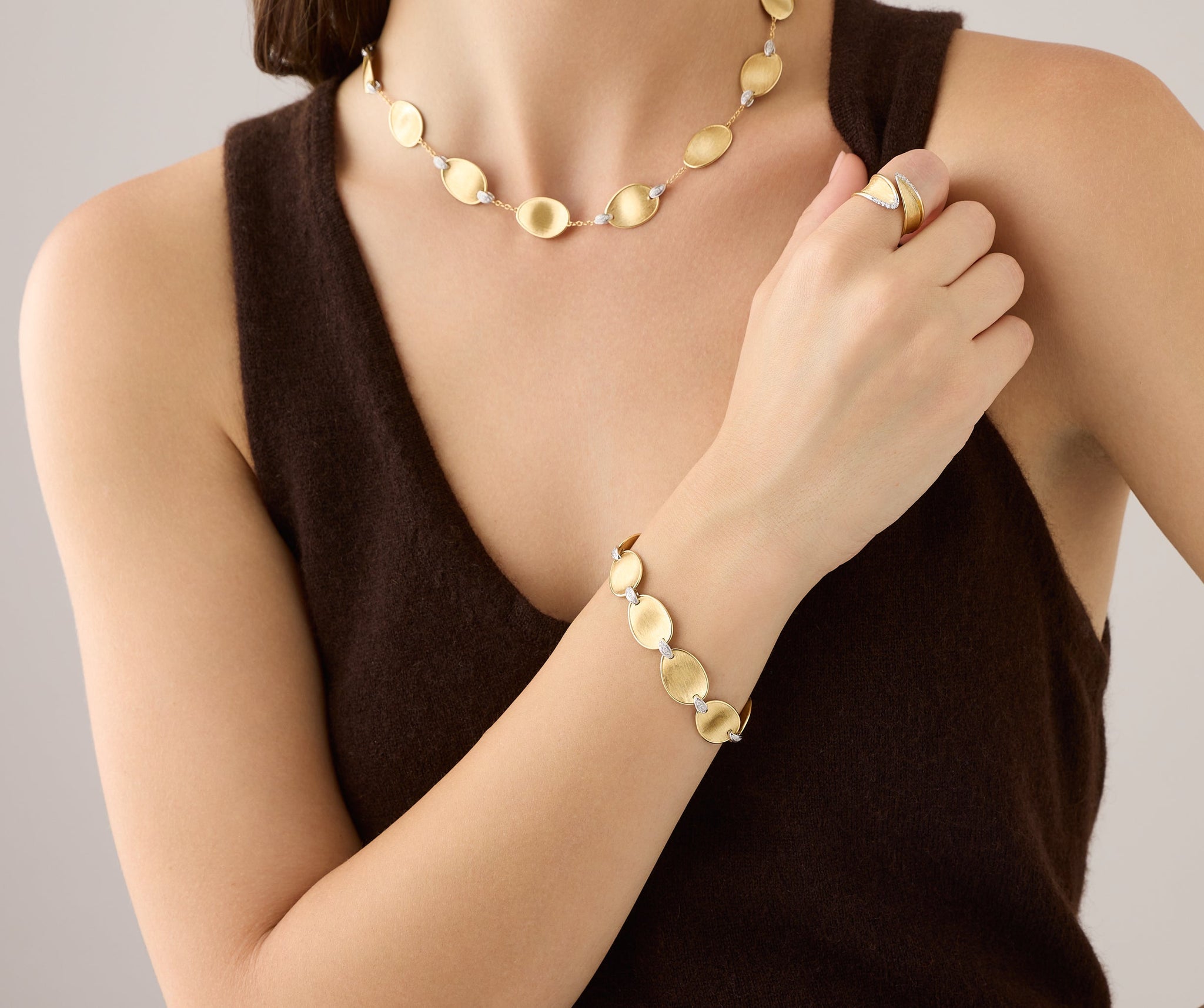 18kt yellow gold leaf bracelet with diamond accents