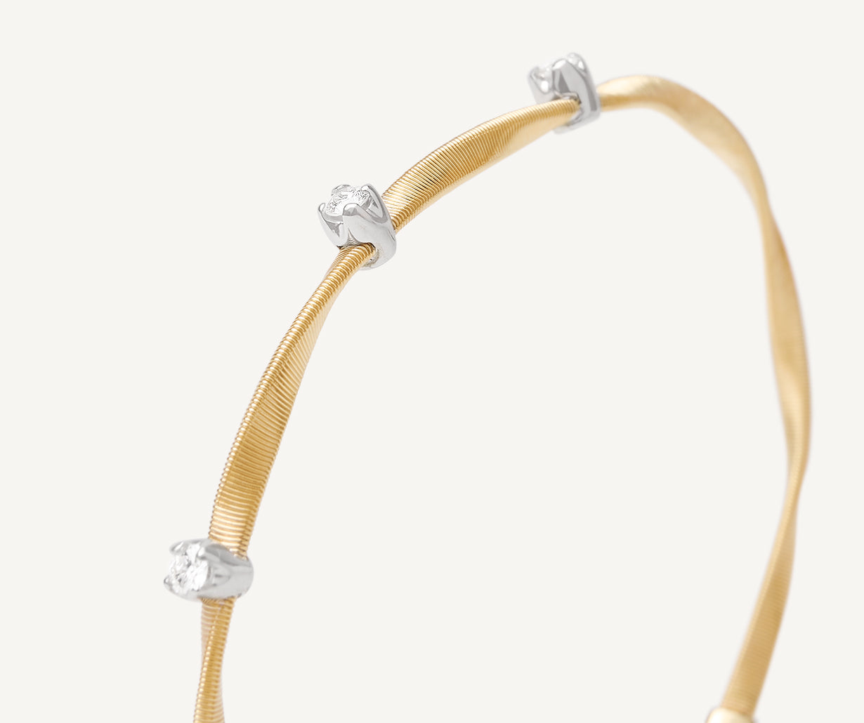 Diamond yellow gold bangle bracelet