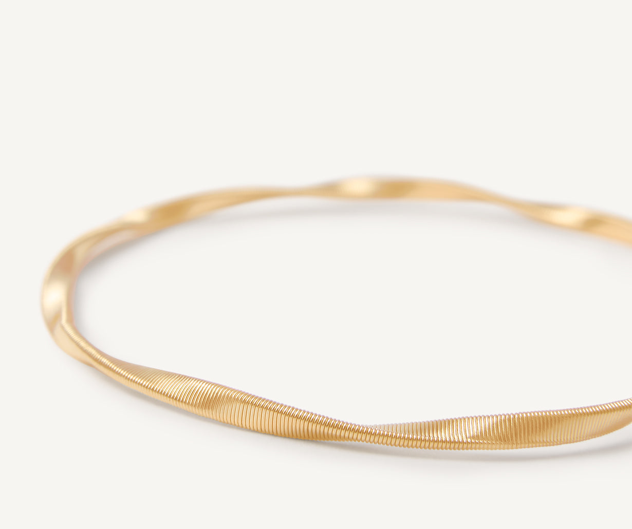 Yellow gold bangle bracelet