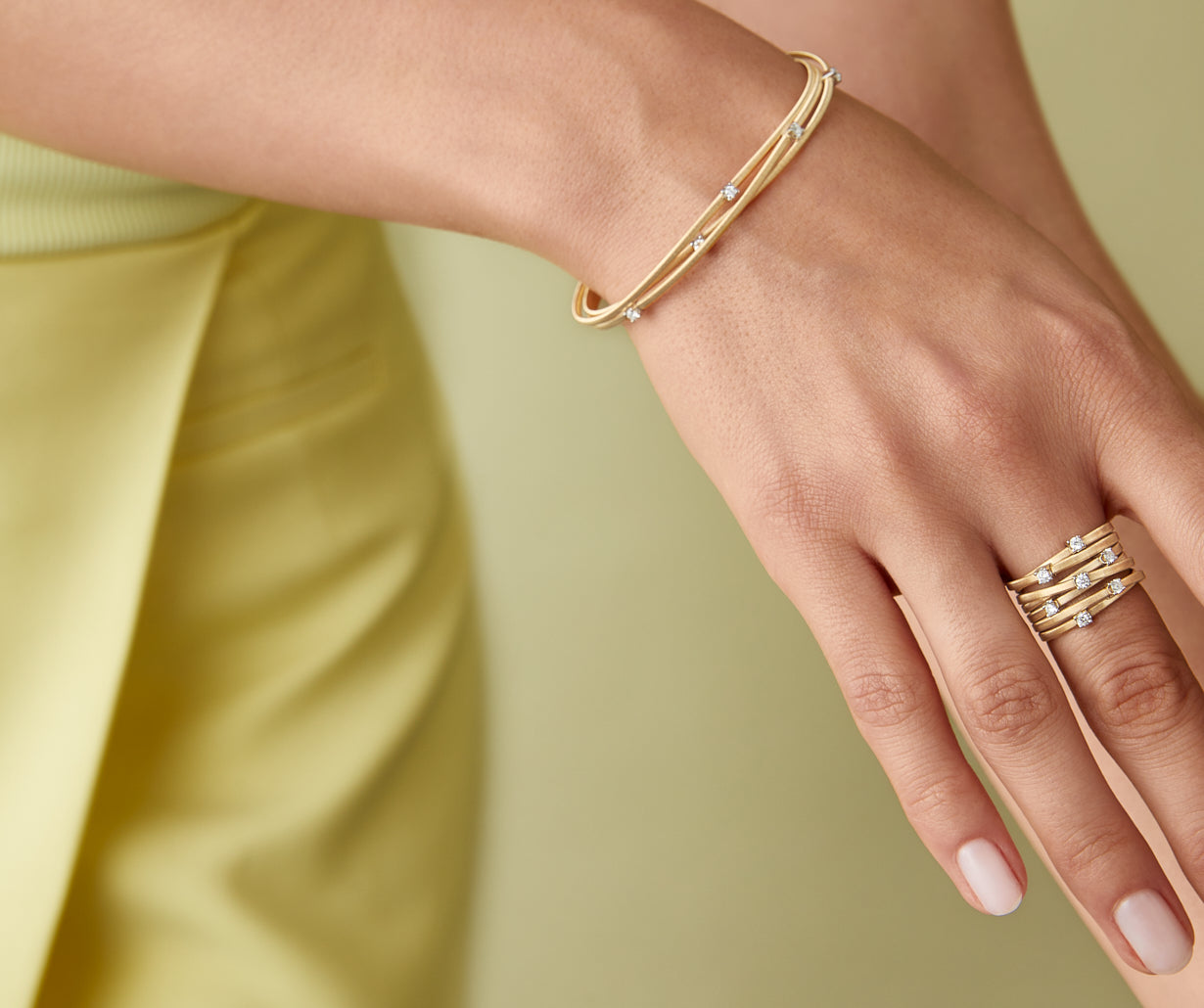 Multi-strand yellow gold diamond bracelet