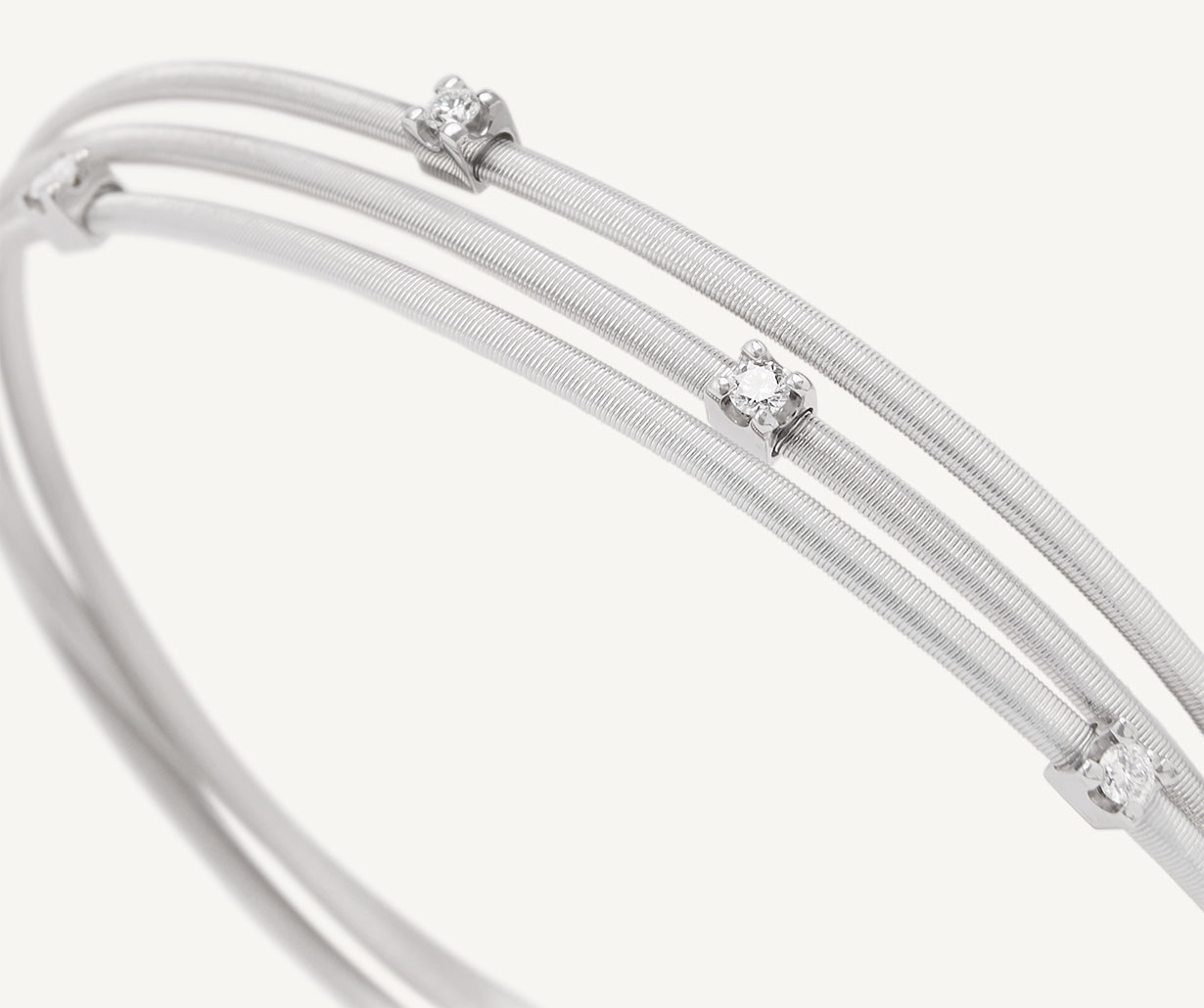 Multi-strand white gold diamond bracelet