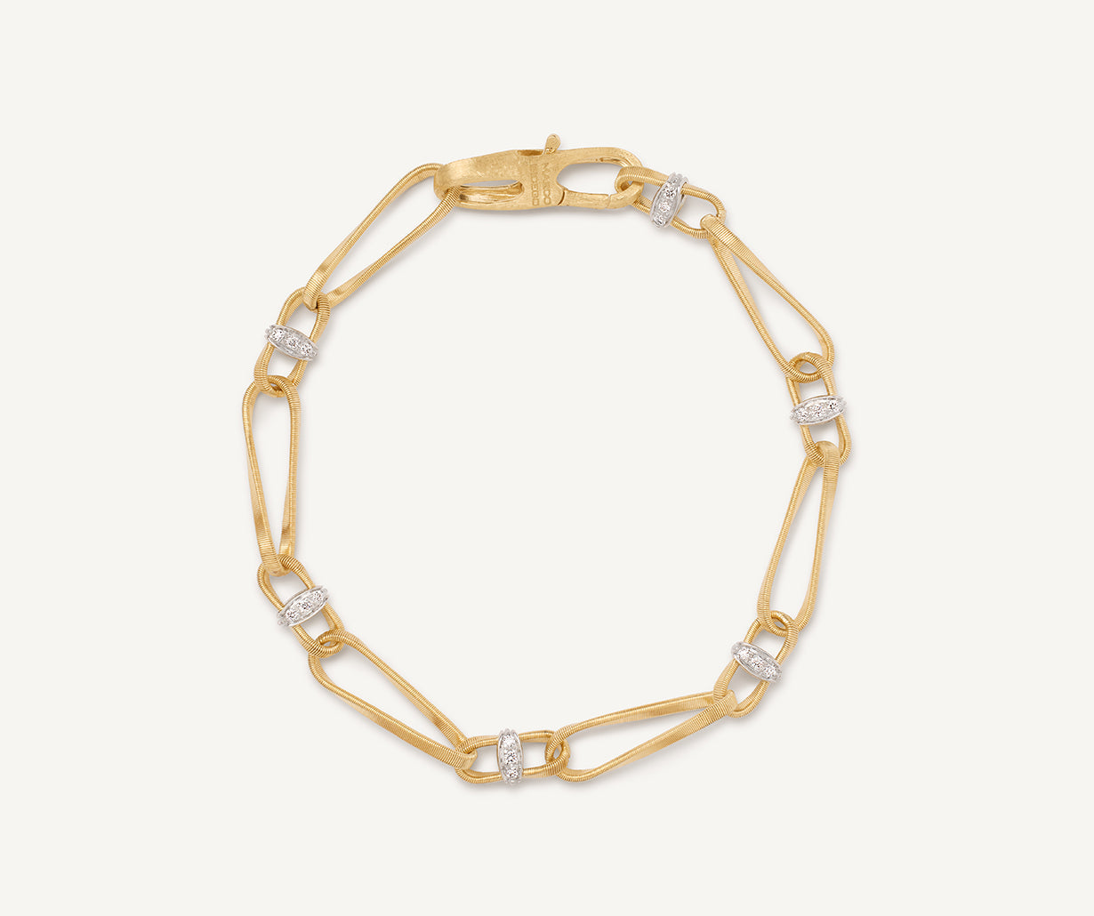18kt yellow gold twisted double coil link bracelet with diamonds