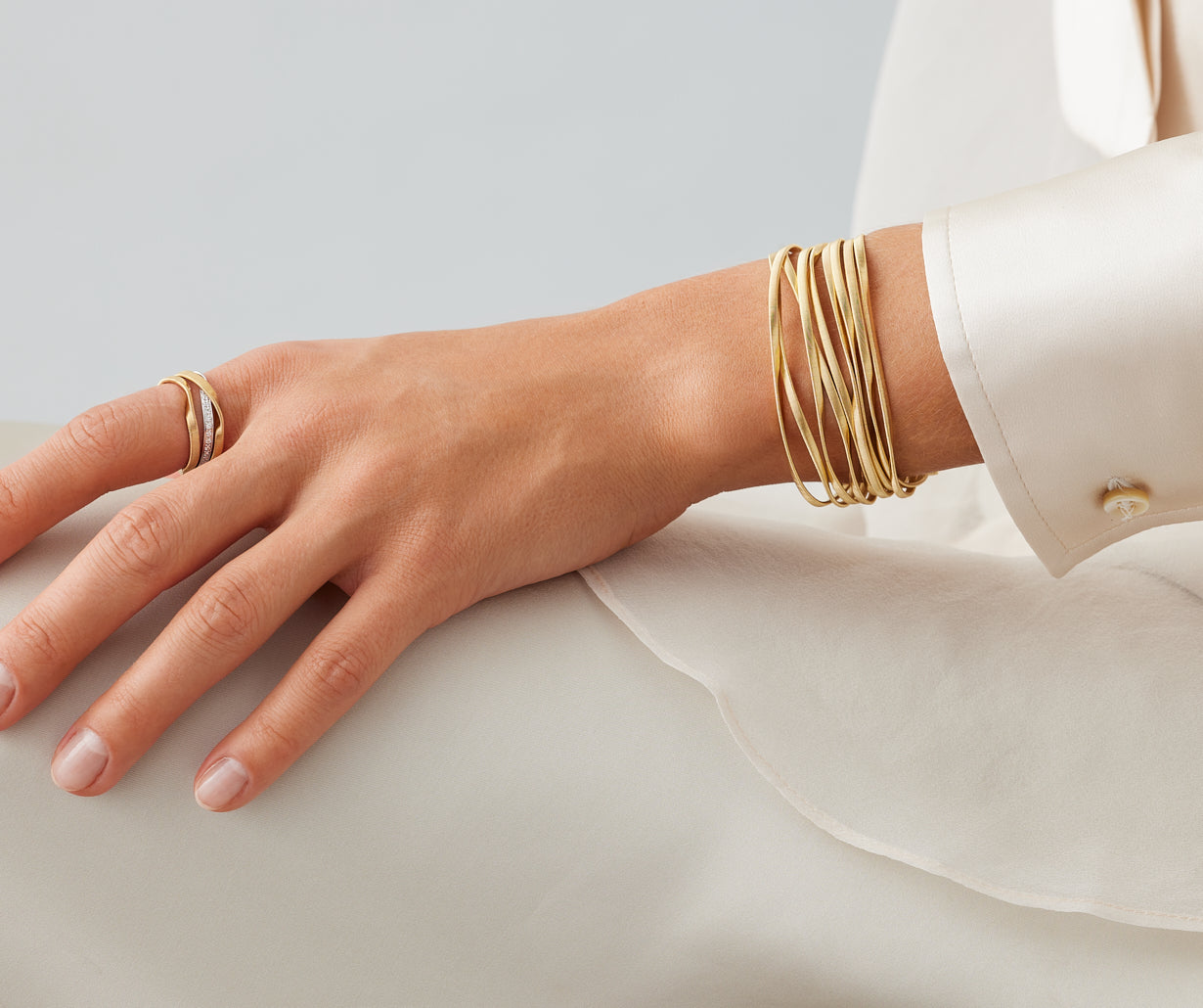 18kt yellow gold nine-strand coil bracelet