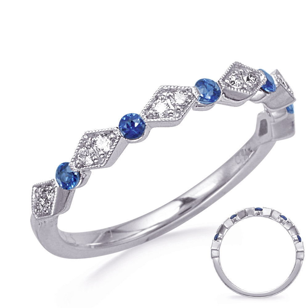 This Gem Stone Ring is available in 14K White Gold. There are a total of 17 stones. There are Rounds with a total carat weight of 0.12 set in a Channel Set|Micro Prong setting.There are Sapphire stones with a total carat weight of 0.18 set in a Channel Set|Micro Prong.